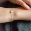 Load image into Gallery viewer, Delicate Pearl Bracelet • Tiny Coin Pearl • Minimalist Jewelry • Layering Bracelet • Bridesmaid Gift • Single Pearl • Gift For Her