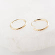 Load image into Gallery viewer, 14k Endless Hoop Earrings • Solid Gold Hoops • Thin Lightweight Hoops • Delicate Earrings • Huggie Hoops • Tiny Hoop Earrings