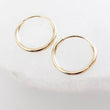 Load image into Gallery viewer, 14k Endless Hoop Earrings • Solid Gold Hoops • Thin Lightweight Hoops • Delicate Earrings • Huggie Hoops • Tiny Hoop Earrings