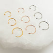 Load image into Gallery viewer, Tiny Dot Hug Hoops • 20 Gauge • Thin Dot Hoops • Open Skinny Hoop • Modern Hoops • Dainty Hug Hoops • Delicate Nose Ring • Surgical Steel