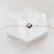 Load image into Gallery viewer, Dainty square cut Garnet bracelet on 14k gold fill cable chain on white background by Studio Blue on Etsy