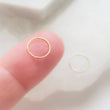 Load image into Gallery viewer, 14k Gold Super Thin Endless Hoops • 22g • Tiny Hoop Earrings • Seamless Hoops • Dainty Earrings • Cartilage • Tragus • Septum • Nose