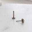 Load image into Gallery viewer, Tiny 3 bead titanium push in flat back stud shown on white background by Studio Blue on Etsy