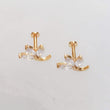 Load image into Gallery viewer, Pair of 3 leaf vine stud in diamond cz, 14k gold plated surgical steel on white background by Studio Blue on Etsy