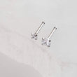Load image into Gallery viewer, Tiny CZ Nose Bone in 316L Surgical Steel, 20 gauge 2mm & 3mm side by side on white background, by Studio Blue on Etsy