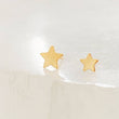 Load image into Gallery viewer, Solid 14K Gold Star studs, front shot of the 3mm and 4mm side by side on white background by Studio Blue on Etsy