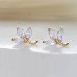 Load image into Gallery viewer, Pair of 3 leaf vine stud in diamond cz, 14k gold plated surgical steel on white background by Studio Blue on Etsy