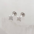 Load image into Gallery viewer, Four-point starburst design in a screw-in style flat back design. 16 Gauge Surgical Steel or 14K Gold plated earrings studs by Studio Blue on Etsy
