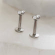 Load image into Gallery viewer, Screw in flat back studs in 316L surgical steel prong set with tiny marquise-shaped diamond cz by Studio Blue on Etsy