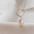 Load image into Gallery viewer, Oval freshwater pearl on oversized loop and delicate chain. Bridal Jewelry by Studio Blue