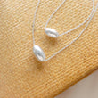 Load image into Gallery viewer, Modern Floating Bead Necklace • Single Sterling Silver Bead • Minimal Style • Layering Necklace • Oval Silver Bead • Gift For Her