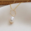Load image into Gallery viewer, Oval freshwater pearl on oversized loop and delicate chain. Bridal Jewelry by Studio Blue