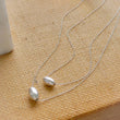 Load image into Gallery viewer, Modern Floating Bead Necklace • Single Sterling Silver Bead • Minimal Style • Layering Necklace • Oval Silver Bead • Gift For Her