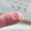 Load image into Gallery viewer, Diamond CZ Flower Nose Ring • 20 Gauge • Cubic Zirconia Flower Nose Hoop • Nose Jewelry • Dainty Nose Ring • Snug Nose Hoop