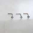 Load image into Gallery viewer, 3 Light Blue Diamond CZ & 14k White gold L-Bend Nose stud, shown on a white background, by Studio Blue on Etsy