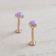 Load image into Gallery viewer, Cabochon purple Opal prong set in 14K fold Flat back studs. Screw in style, 18 gauge. For earlobe, monroe, nose, cartilage, tragus, conch piercings . Body Jewelry