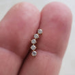 Load image into Gallery viewer, Diamond CZ Ear climber featuring 5 stones, made from implant grade titanium, 14k gold plated. Screw in flat back style for cartilage or lobe by Studio Blue on Etsy