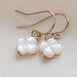Load image into Gallery viewer, Hand carved mother of pearl 4 leaf clover drop earrings in 14k gold fill. - By Studio Blue