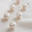 Load image into Gallery viewer, Large, white freshwater pearl long drop earrings. Wedding Jewelry - by Studio Blue