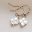 Load image into Gallery viewer, Hand carved mother of pearl 4 leaf clover drop earrings in 14k gold fill. - By Studio Blue