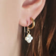 Load image into Gallery viewer, Hand carved mother of pearl 4 leaf clover drop earrings in 14k gold fill. - By Studio Blue
