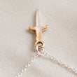 Load image into Gallery viewer, Tiny dagger charm necklace in Sterling silver with Bronze accent on a delicate silver chain by Studio Blue on Etsy.