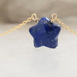Load image into Gallery viewer, Gemstone star necklace in Lapis Lazuli with 14k gold fill chain on model, by Studio Blue on Etsy