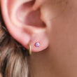 Load image into Gallery viewer, Opal flat back studs. 14K gold plated 316L Surgical Steel, push in style in purple, on model by Studio Blue on Etsy