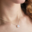 Load image into Gallery viewer, Gemstone star necklace in Rainbow Moonstone with 14k gold fill chain on model, by Studio Blue on Etsy