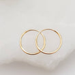 Load image into Gallery viewer, 14k Endless Hoop Earrings • Solid Gold Hoops • Thin Lightweight Hoops • Delicate Earrings • White or Yellow Gold • Tiny Hoop Earrings
