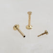 Load image into Gallery viewer, Tiny 2mm dot studs in solid 14k Gold, Screw in flat back nap in earrings by Studio Blue on Etsy