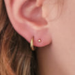 Load image into Gallery viewer, Solid 14K Yellow Gold Ball studs. Flat back, push-in style. 18 gauge Labret. 3mm size on model by Studio Blue on Etsy