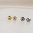Load image into Gallery viewer, Two pairs of Titanium Ball backs with silicone center, one pair in silver, one pair in 14k gold plate on white background, by Studio Blue on Etsy