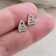 Load image into Gallery viewer, Sterling Silver Ouija Board-inspired stud earrings between two fingers. Yes & No, Moon & Star. By Studio Blue on Etsy