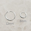 Load image into Gallery viewer, Tiny Sterling Hoops • Hinged Huggie Hoop Earrings • Dainty Silver Hoop Earrings • Waterproof • Comfort Hoops • Ear Stack • Minimalist Gift