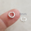 Load image into Gallery viewer, Tiny Sterling Hoops • Hinged Huggie Hoop Earrings • Dainty Silver Hoop Earrings • Waterproof • Comfort Hoops • Ear Stack • Minimalist Gift