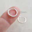 Load image into Gallery viewer, Tiny Sterling Hoops • Hinged Huggie Hoop Earrings • Dainty Silver Hoop Earrings • Waterproof • Comfort Hoops • Ear Stack • Minimalist Gift