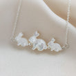 Load image into Gallery viewer, Bunny Mom Necklace • Mother & Baby Bunnies • Rabbit Jewelry • Mother of Pearl • Gift for Mom • New Mom Gift • Mother's Day Necklace