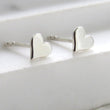 Load image into Gallery viewer, Teeny Tiny Heart Studs • Small Earring Studs • Petite Hearts • Solid Heart Posts • Simple Minimal Earrings • Sterling Silver Heart Studs