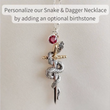 Load and play video in Gallery viewer, Video of the Snake and Dagger necklace showing how you can personalize it with your birthstone.