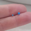 Load and play video in Gallery viewer, Opal L Bend Nose Stud • 20g • Surgical Steel • 2mm and 3mm Prong Set Blue or White Opal • Delicate Nose Stud • Dainty Stud