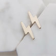 Load and play video in Gallery viewer, 14K Gold Lightning Bolt Studs • Dainty Lightning Bolts • Tiny Gold Studs • Thunderbolt Earrings • Lightning Earrings • Gift For Her