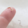 Load image into Gallery viewer, Tiny Star Nose Stud in 14k Gold - Studio Blue