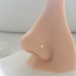 Load image into Gallery viewer, Tiny Star Nose Stud in 14k Gold - Studio Blue