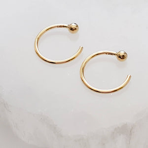 Yellow gold open hoops with 2mm ball beads on white background