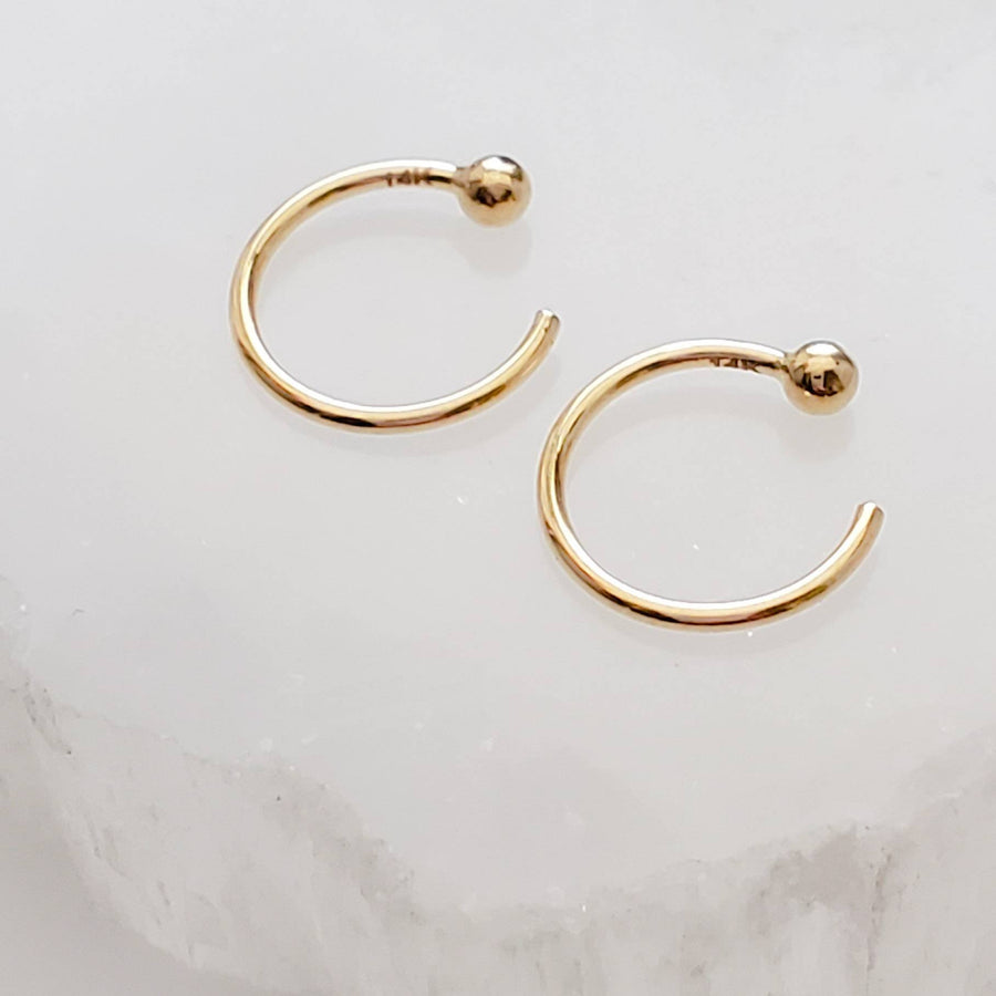Yellow gold open hoops with 2mm ball beads on white background