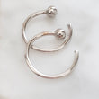 Load image into Gallery viewer, White gold open huggie hoops with 2mm ball beads on white background