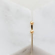 Load image into Gallery viewer, Super Tiny Ball Studs in 10K Gold - Studio Blue