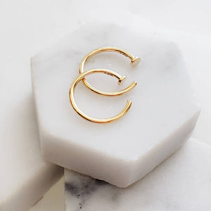 14K Yellow gold Nose Hoop, available in yellow or white gold 20g or 18g on white background