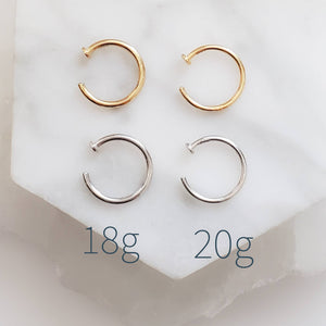 14K Yellow gold Nose Hoop, available in yellow or white gold 20g or 18g on white background